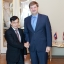 Andrejs Klementjevs tiekas ar Laosas vēstnieku