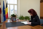 Speaker of the Saeima signs book of condolence at Belgian embassy