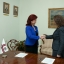Solvita Āboltiņa ar LDDK vadību paraksta konferences noslēguma dokumentu